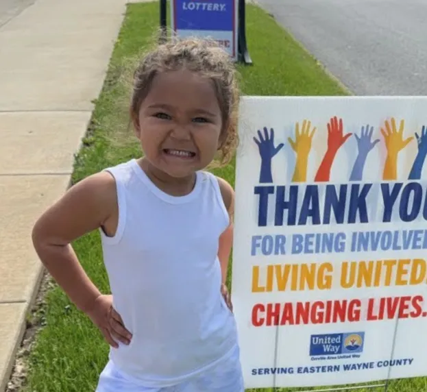 Young child helping with campaign