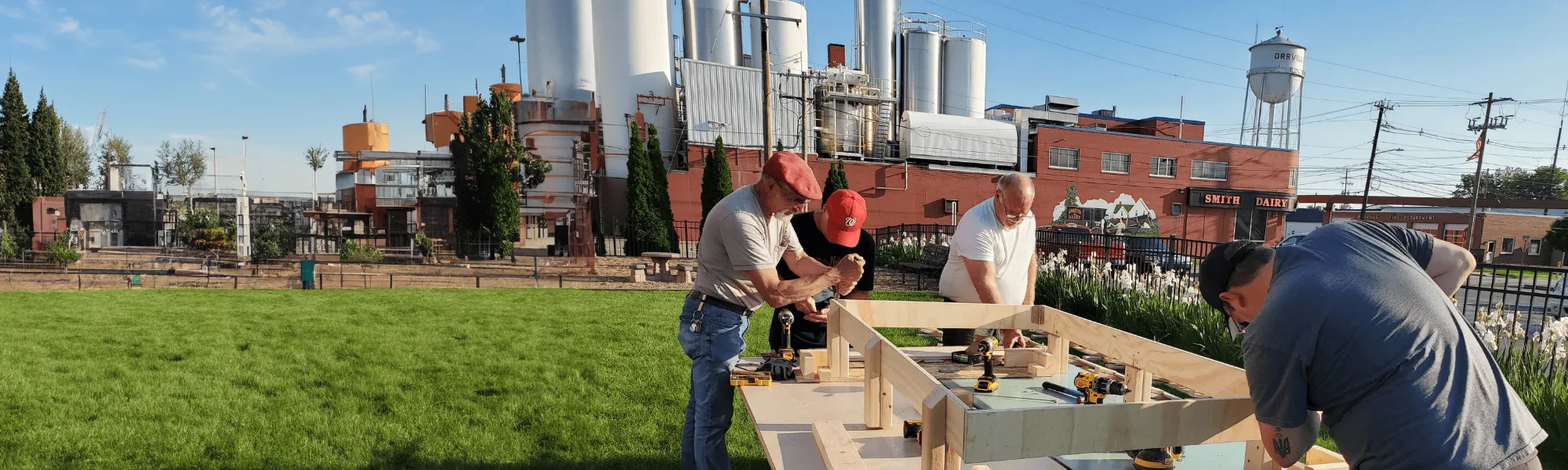 Volunteers build beds for Sweet Dreams